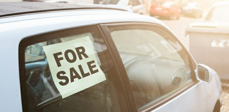 better to buy new or used car